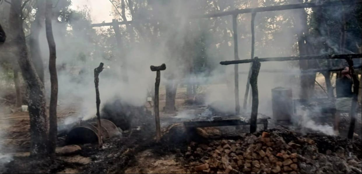 A thatched roof caught fire while roasting corn.
