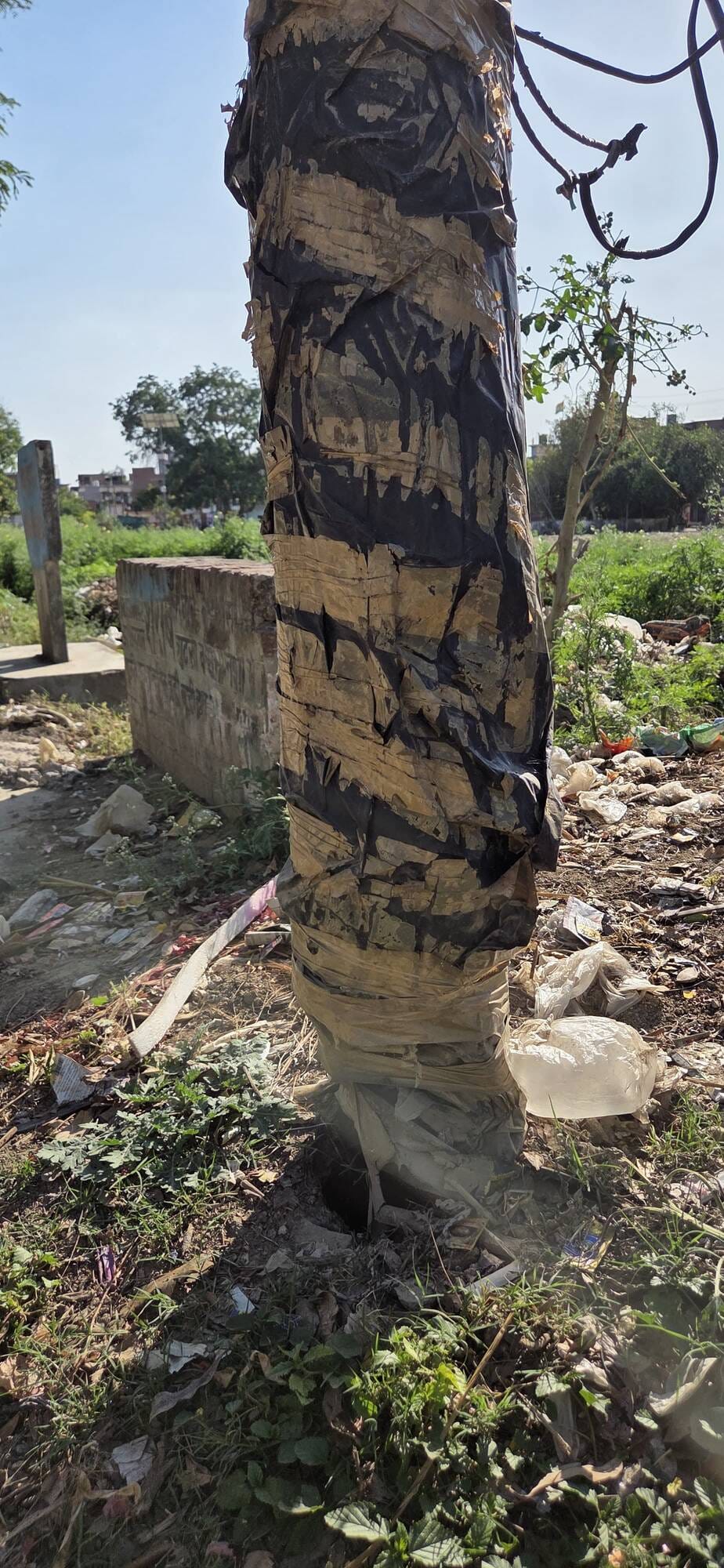An 11,000-volt line runs on dilapidated poles, threatening a population of 12,000.