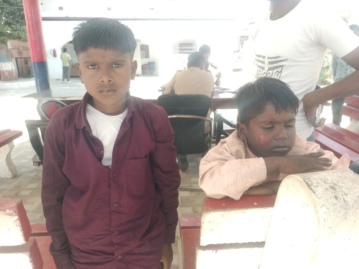 Woman on Motorcycle Killed in Collision with Container in Alhaganj; Husband and Two Sons Injured