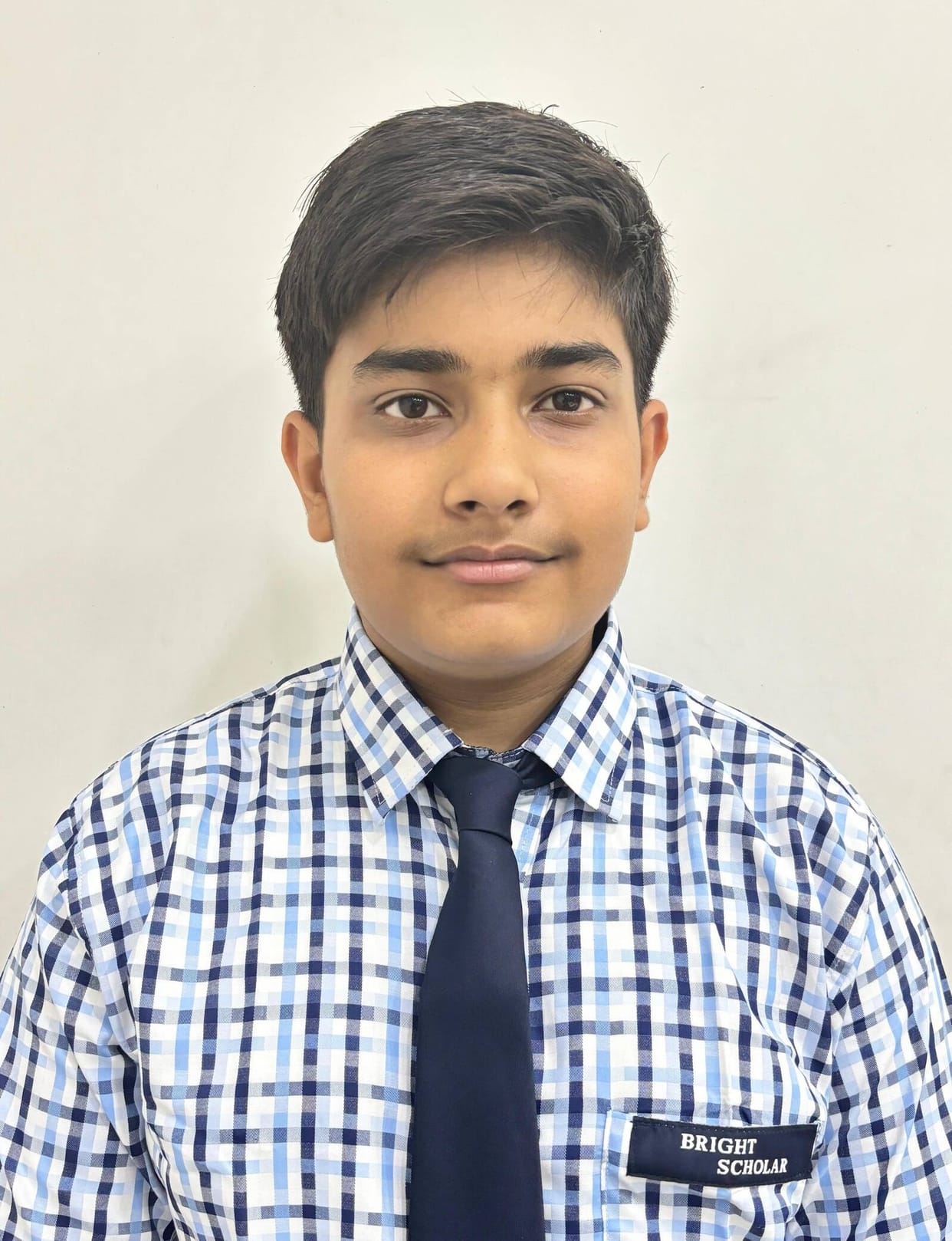 Manan brought laurels to the district by scoring 99.9 percent marks.