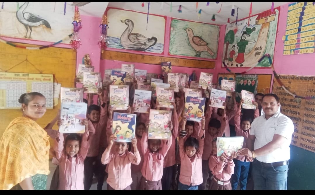 The 'School Chalo Abhiyan' resonates on the banks of the Ganga River, raising awareness about education through public support.