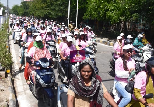 Message of women empowerment given through scooty rally