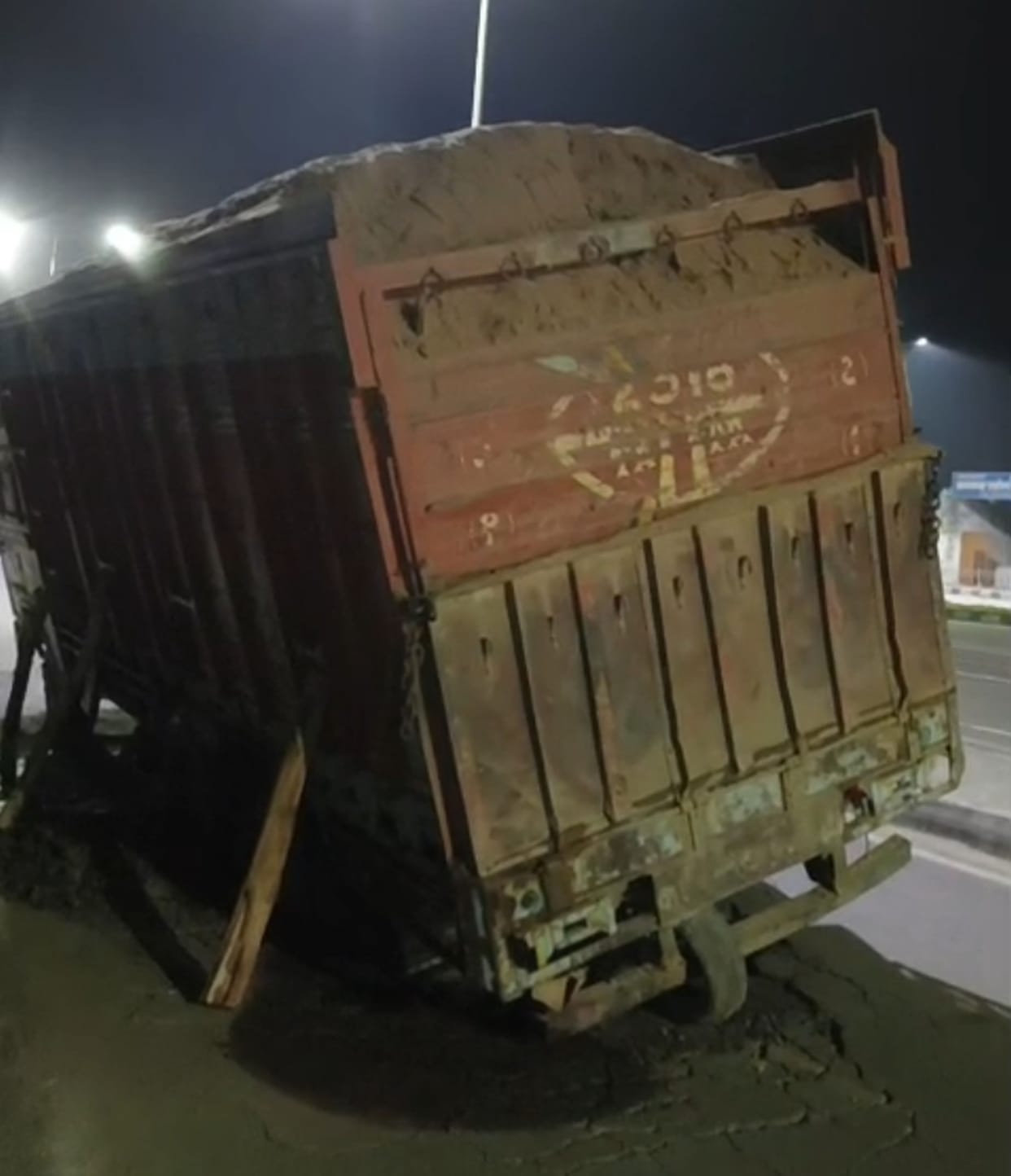 A truck loaded with gravel got stuck on the service road, an accident was averted.