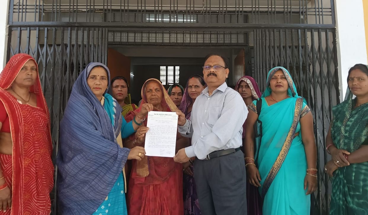 Women surrounded the CMO office.