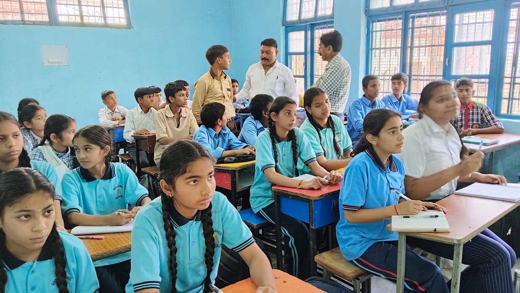 Students sitting together after 28 years at Nadaun school