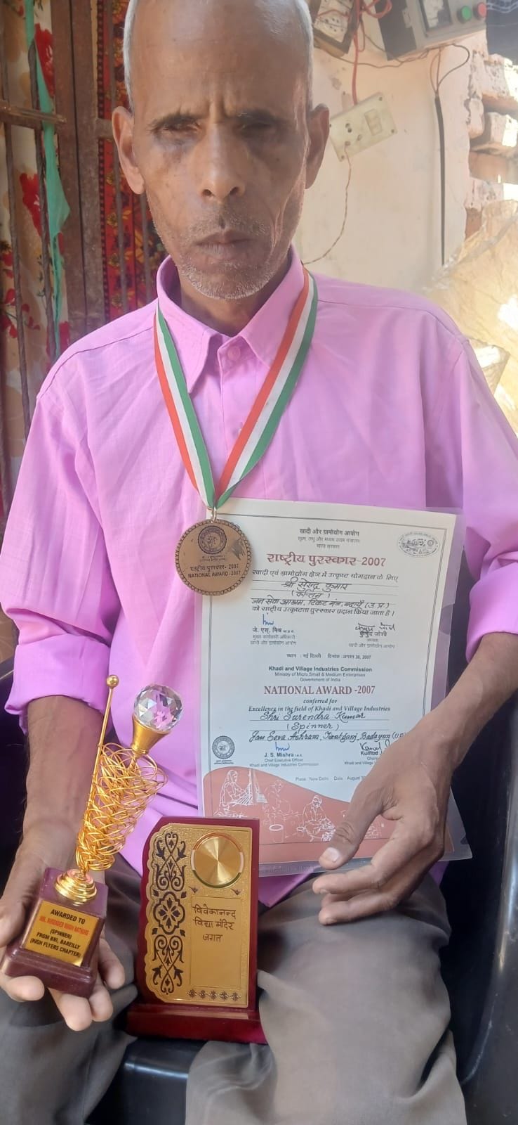 Surendra, a visually impaired National Award recipient, wanders in pursuit of housing benefits.
