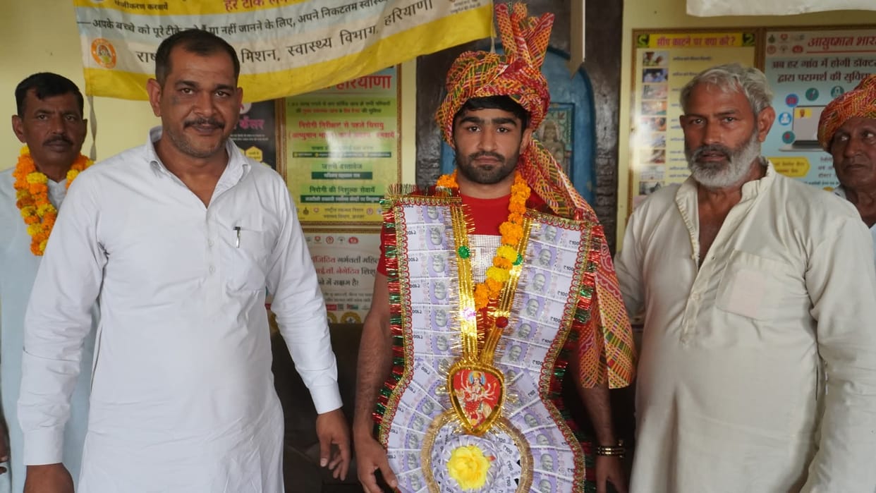 Asian Wrestling Championship bronze medalist Sachin honored