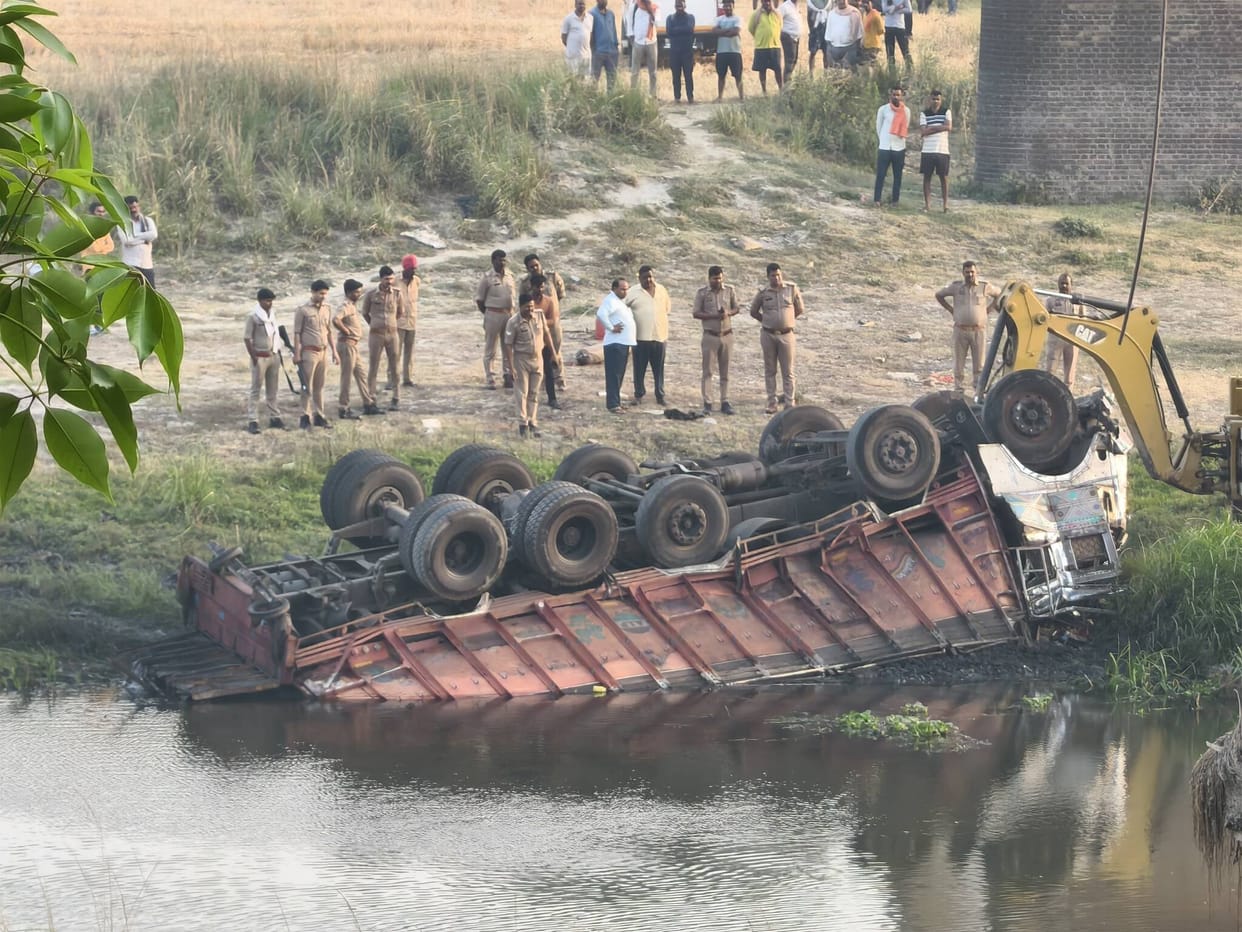 The driver dozed off and the coal-laden truck broke the bridge railing and fell into the river.