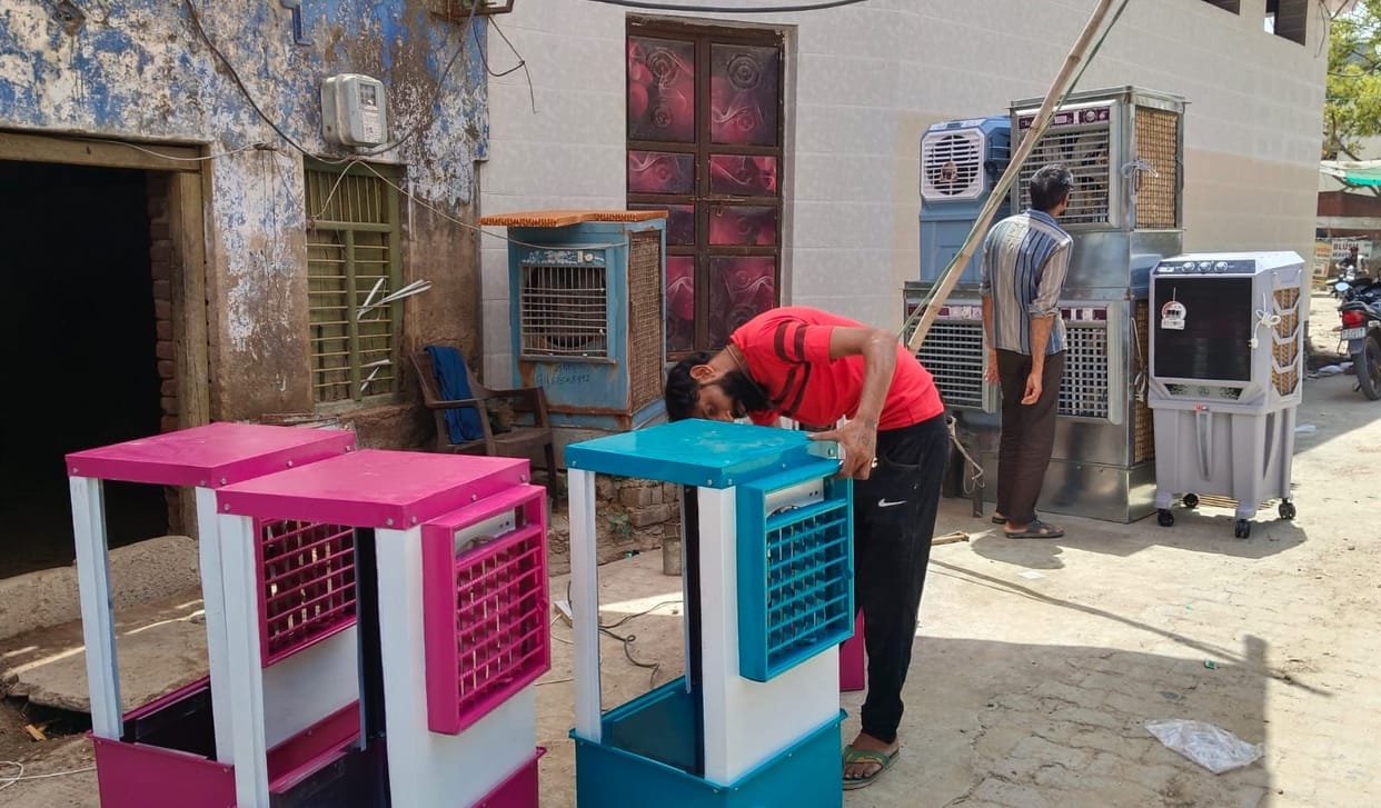 As the heat intensifies, demand for coolers surges in markets, and people are busy shopping.