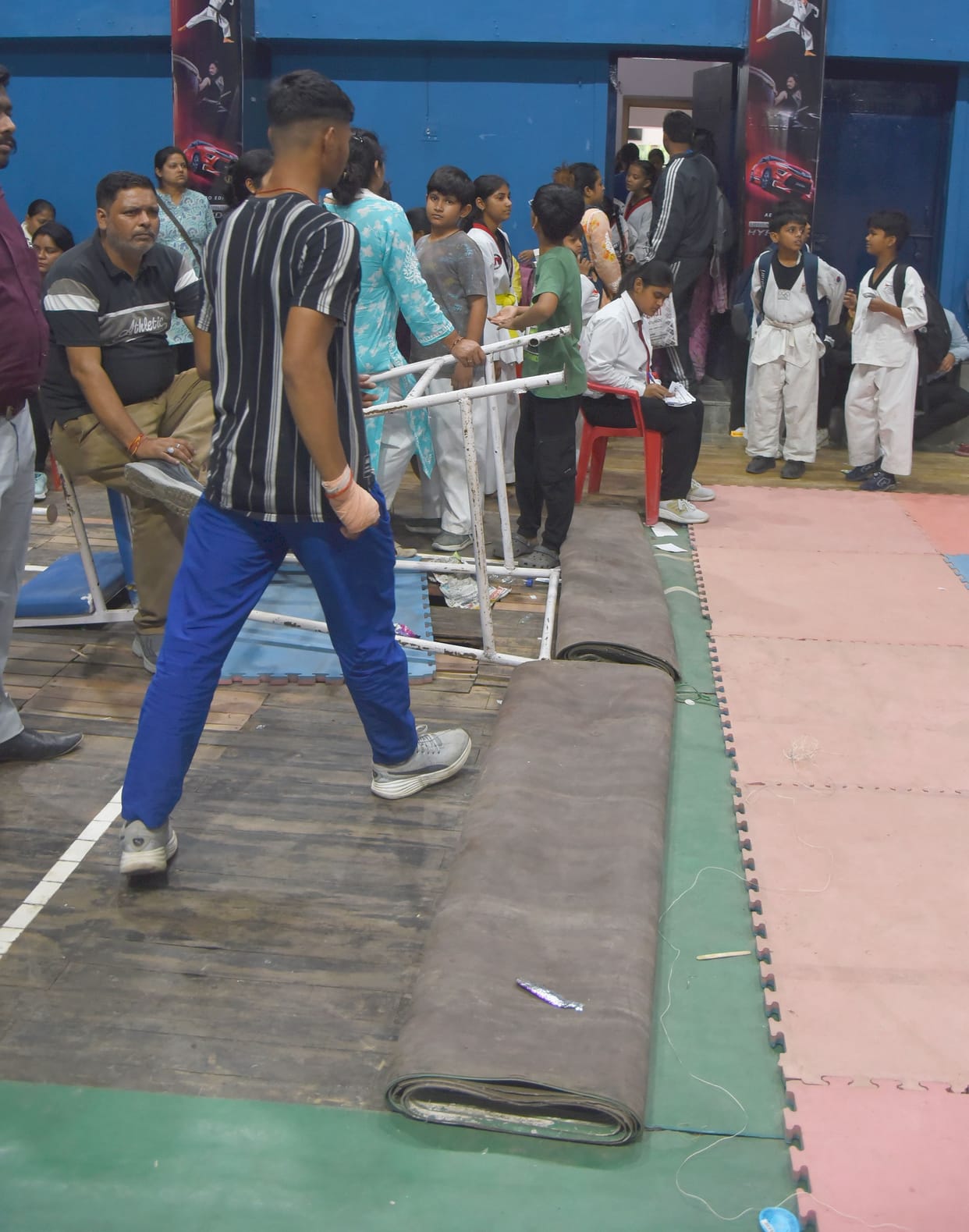 Taekwondo championship being held on dilapidated badminton court