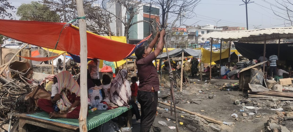 The victims are rebuilding their burnt homes.