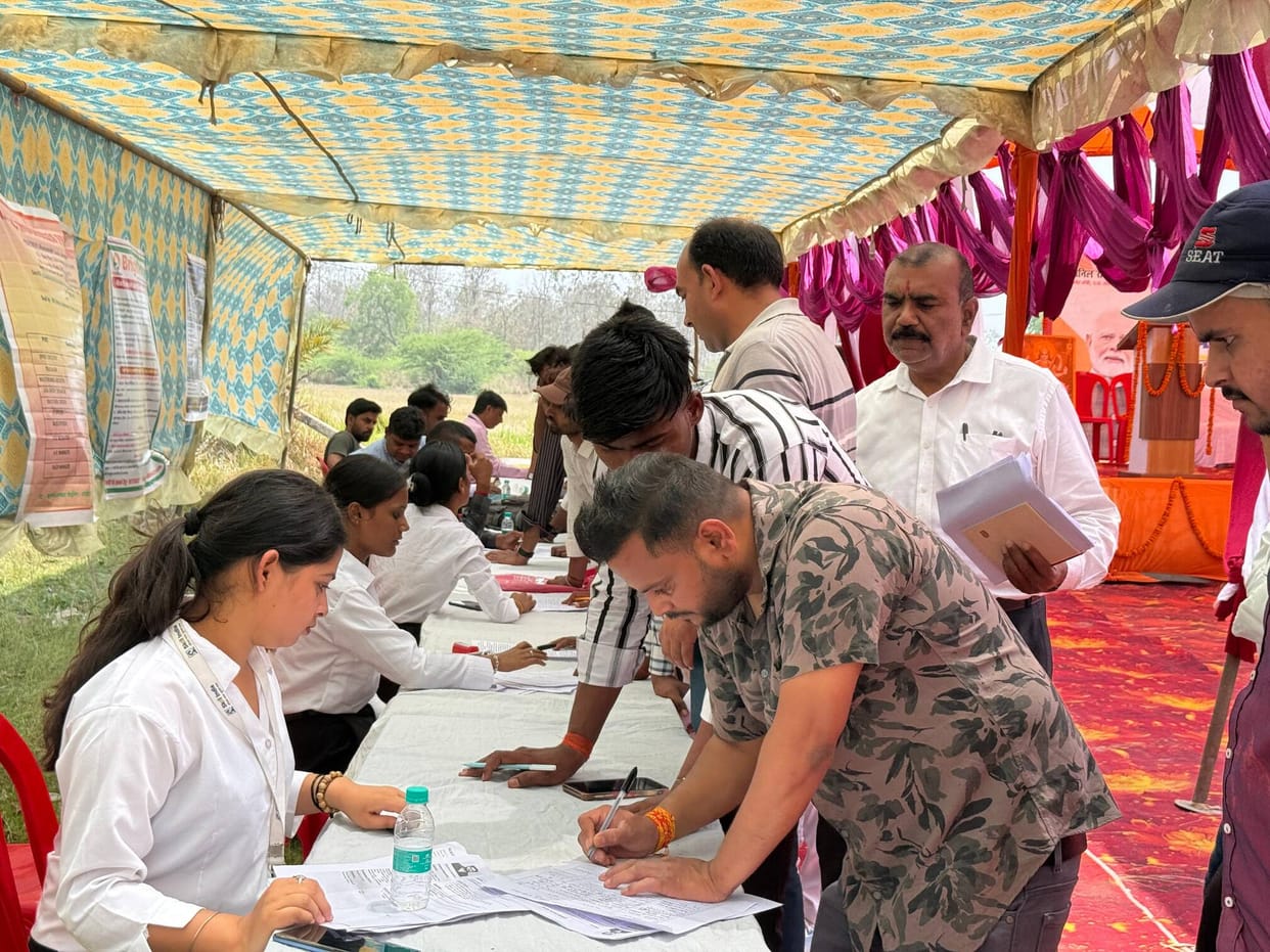 Unemployed youth registering at the employment fair.