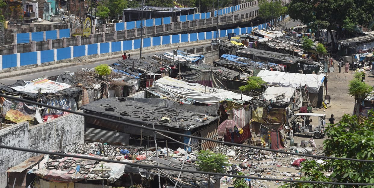 There is no grain in the fields, but a crop of slums is flourishing.