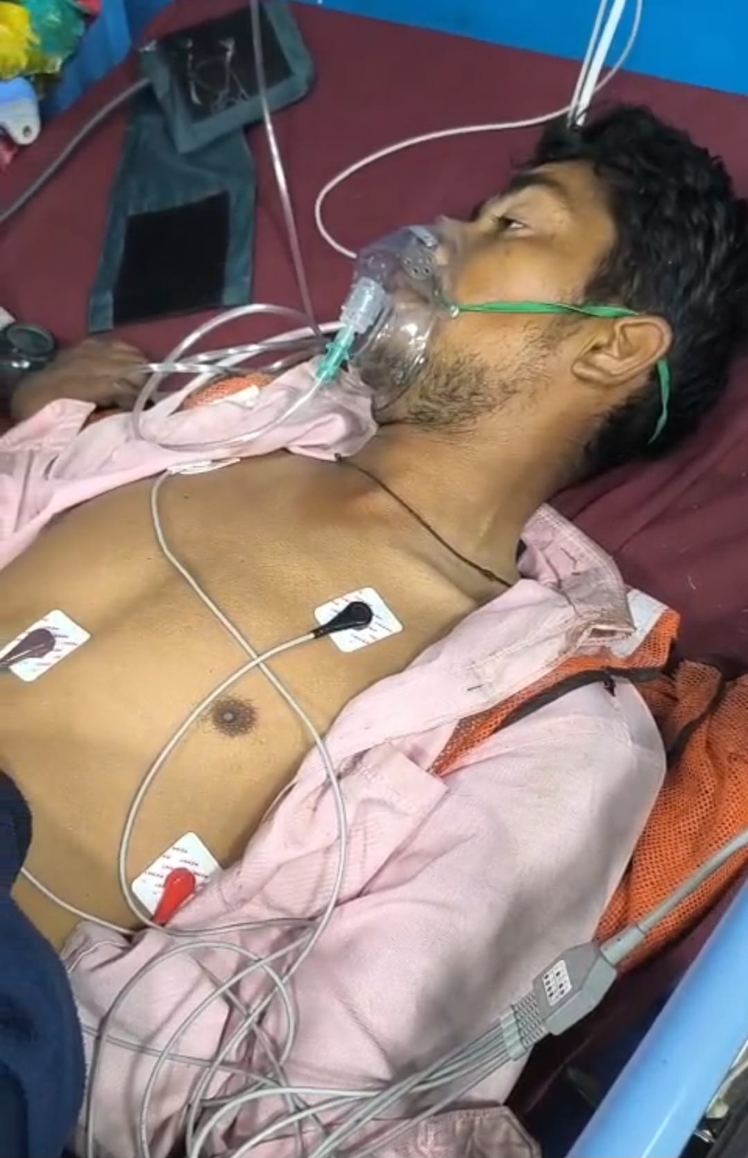 A worker watering plants on the highway was injured.
