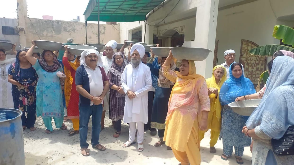Rendered service in the construction of the roof of the Guru Ghar's new building.