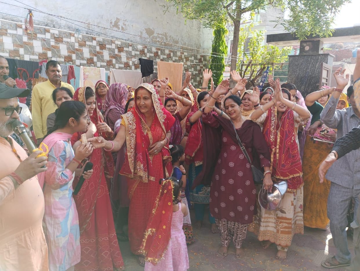 Devotees Sway to the Bhajans of Radha Rani