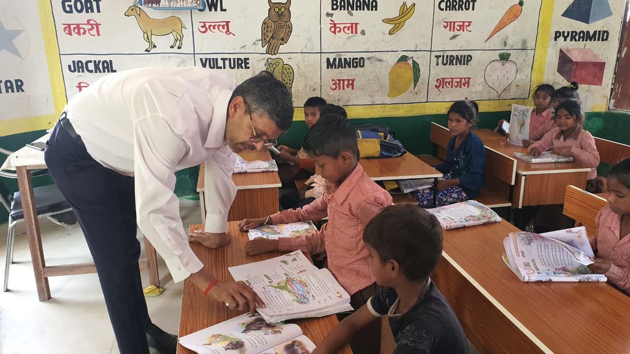 Made children read books and write alphabets