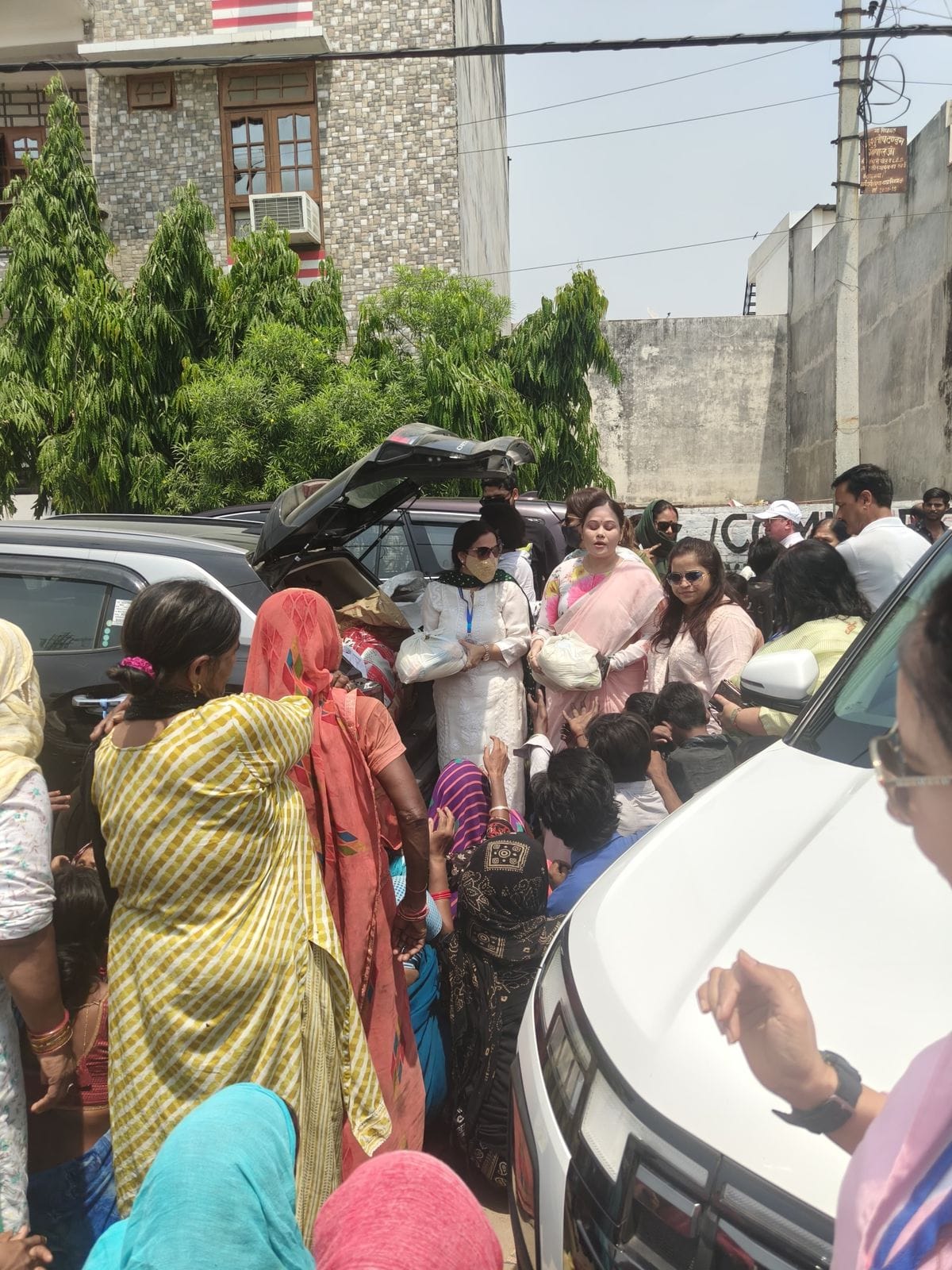 Social workers came forward to help fire victims and distributed relief materials.