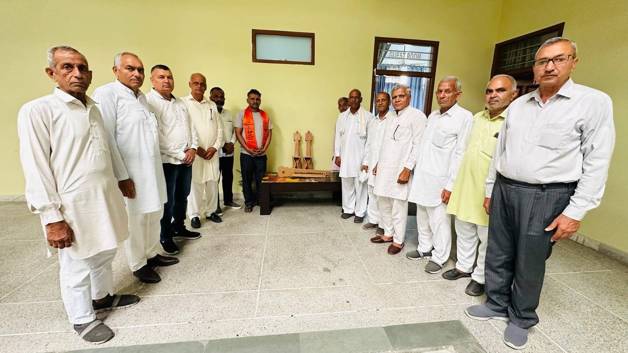 Nisar, a master craftsman of musical instruments, was honored
