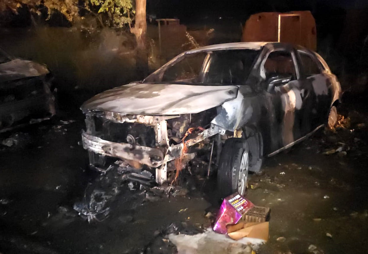 Three cars caught fire after being set ablaze by fireworks