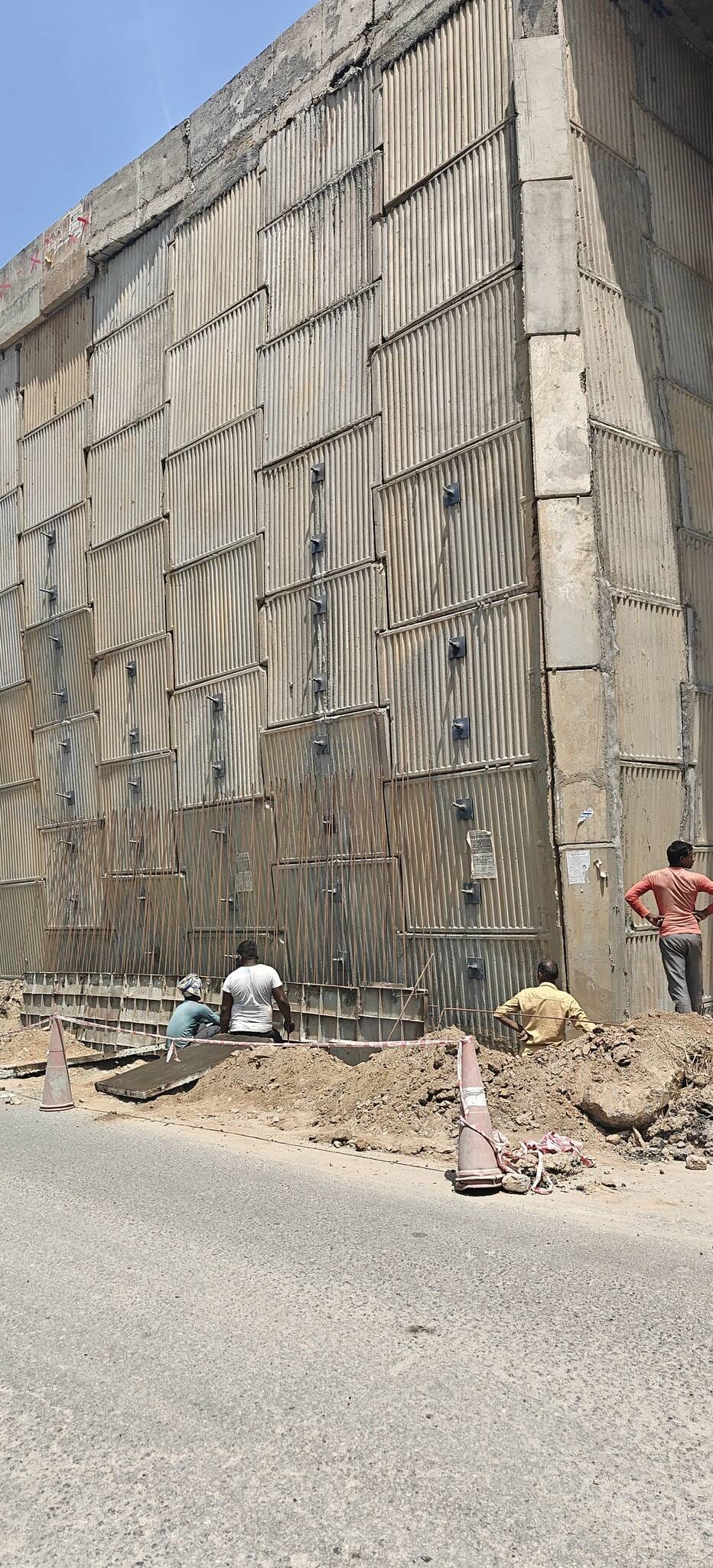 Cracks have appeared on the walls of the overbridge being constructed at the railway crossing in Jungle Wali