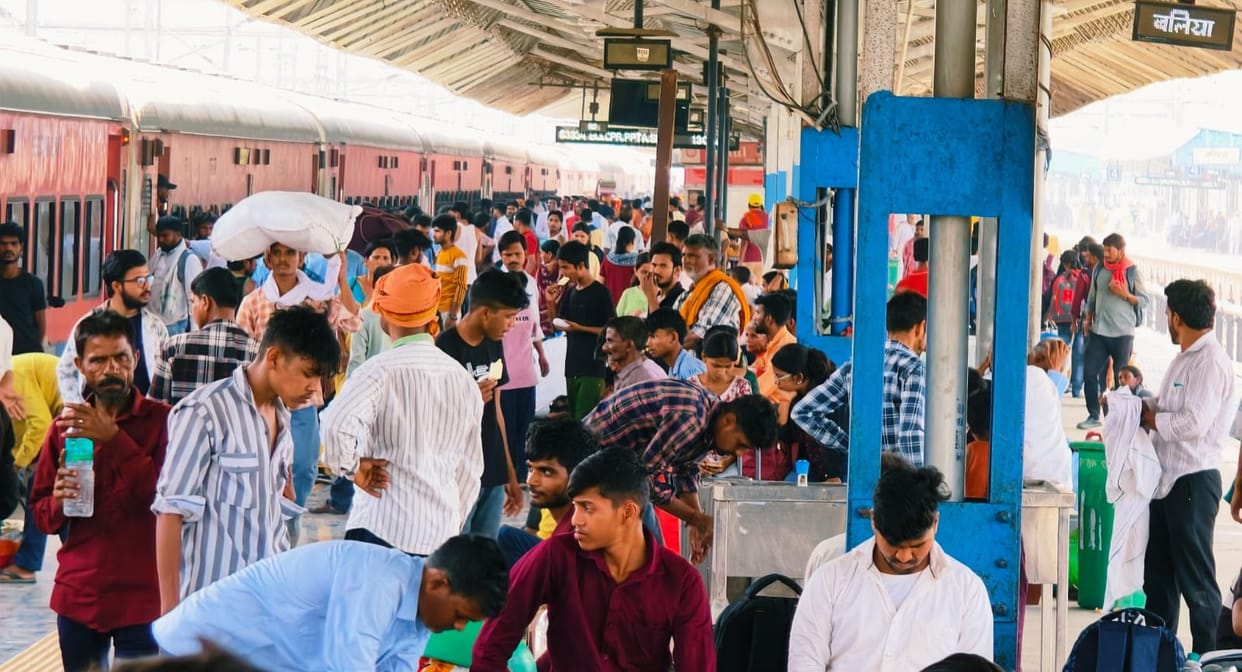 Trains to Bihar are packed, gates remain unopened, and passengers are forced to travel on the floor.