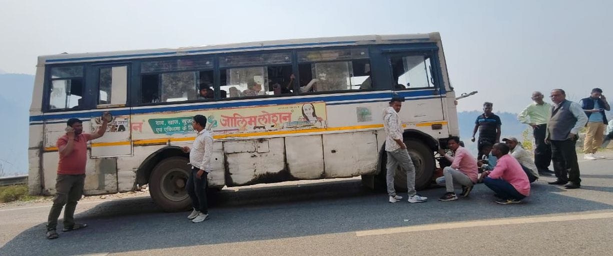 The roadways bus gasped on the climb of the Ghat, passengers were miserable in the sun.