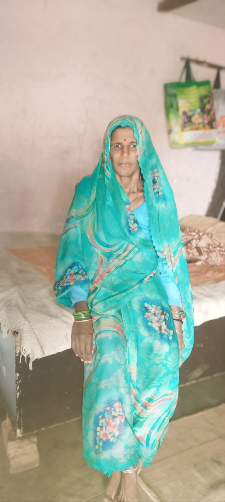 An elderly woman drowned after slipping while bathing in the Yamuna; divers are searching for her.