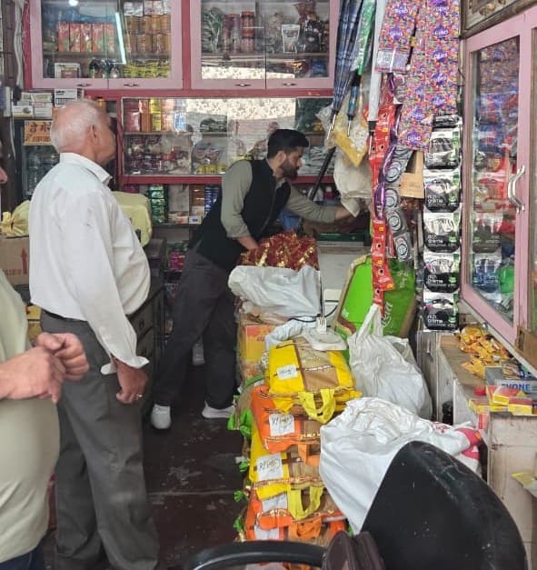 Four illegal pushcarts removed near the Post Office; one seized.
