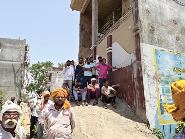 A sick father stands in line for hours in the scorching sun to feed his children...