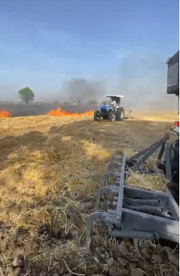 Fire in the field due to unknown reasons, spread over 100 acres