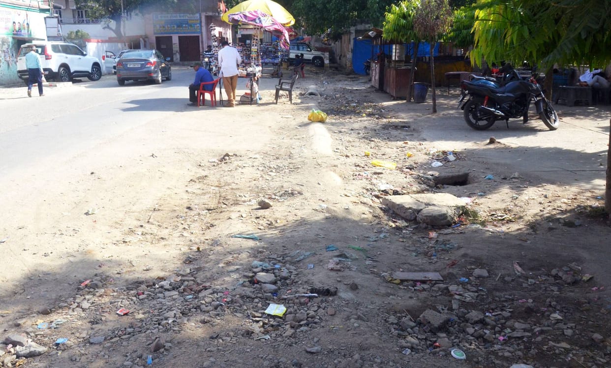 Green Road expansion work stalled... pedestrians troubled by dug-up road