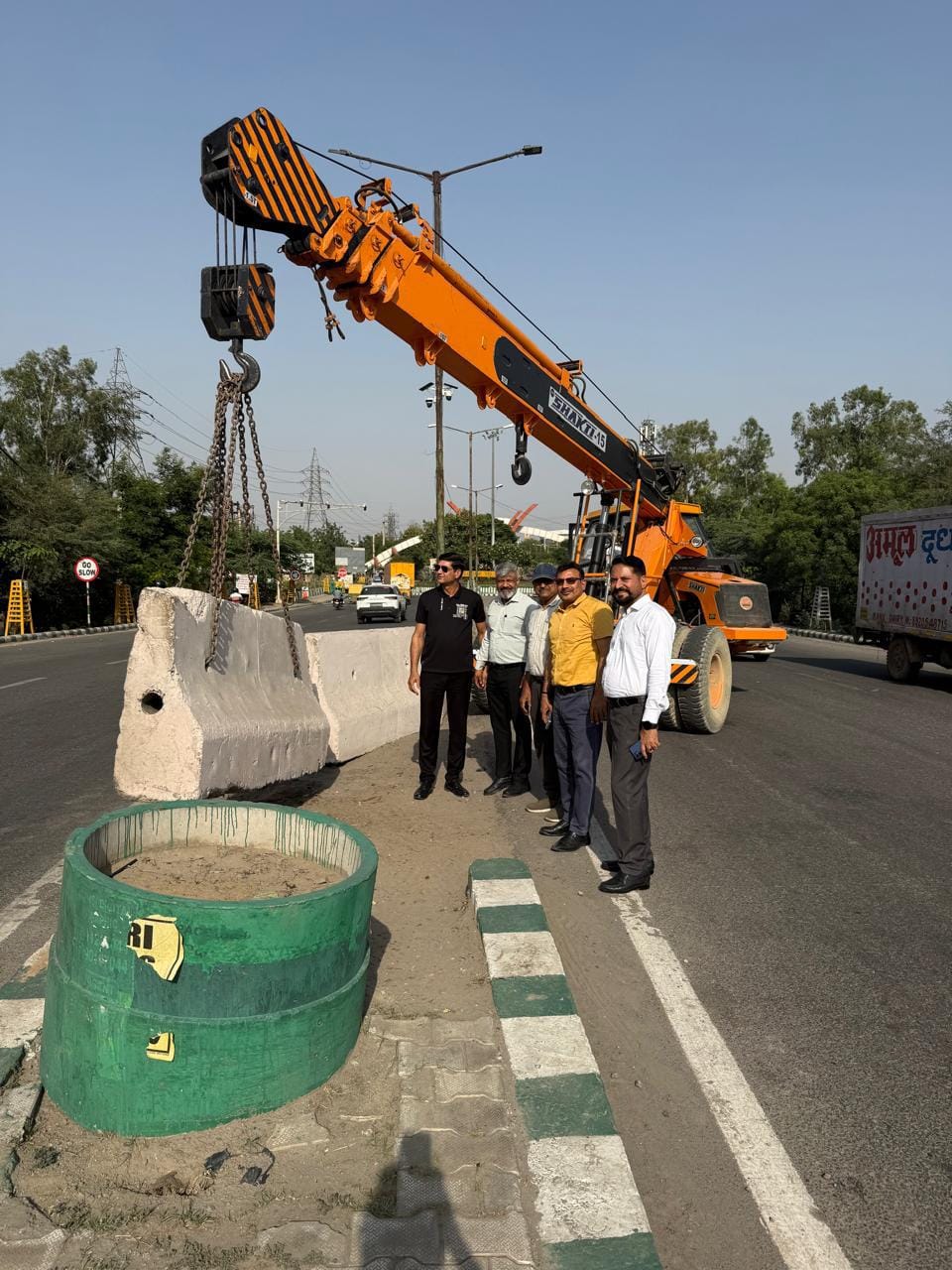 Cooperative relief from traffic jam at IMT square, barricades removed