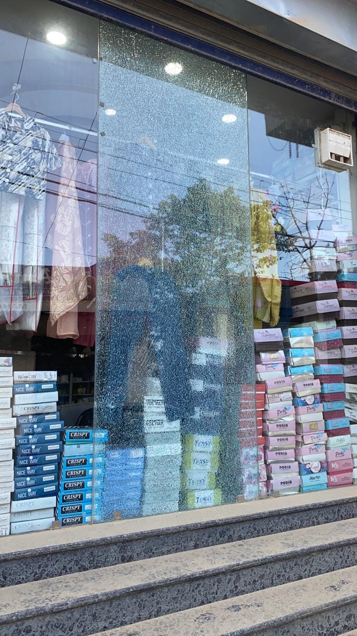 A stone thrown from a car tire shattered a shop window.