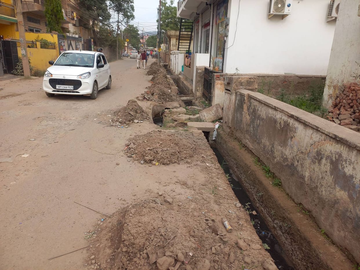 The drain was cleaned but the filth was left on the road, people were suffering from the smell.