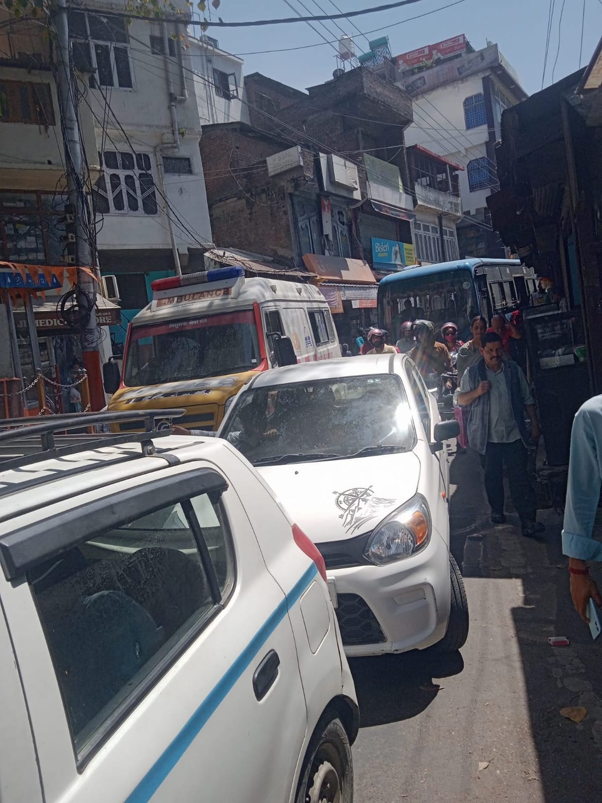 Ambulance stuck near the Old Bus Stand for ten minutes.
