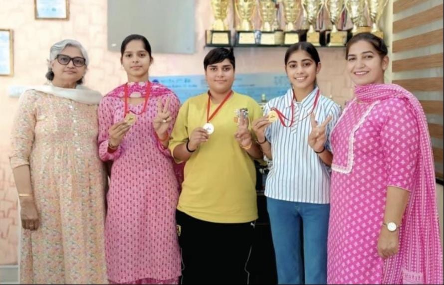 Five girl students won gold medals in the woodball competition.