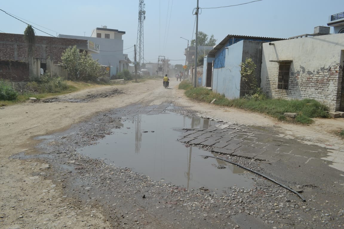 Residents of Kunjpura are forced to live on dilapidated roads and drink contaminated water.