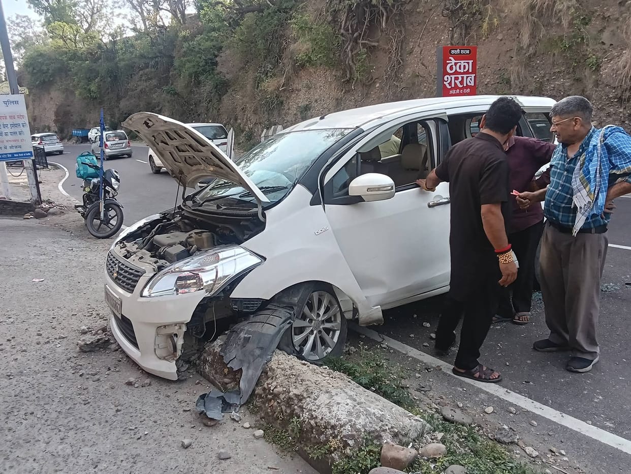 Woman crossing the road was hit by a car and narrowly escaped death.