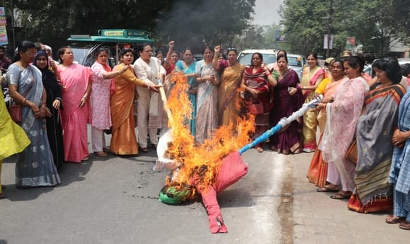 BJP workers burnt effigies of Rahul Gandhi and Akhilesh Yadav.