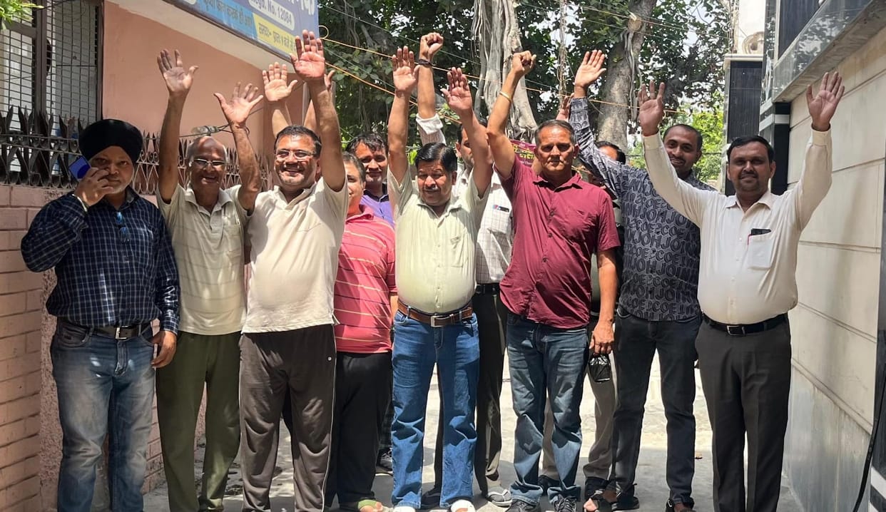 People protested against the broken cemented street.