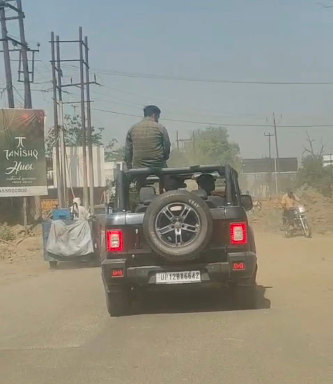 A young man performing stunts on a Thar vehicle was arrested along with his companion.