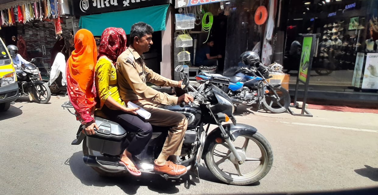 3 people ride on one bike, no worries about rules, no love for life