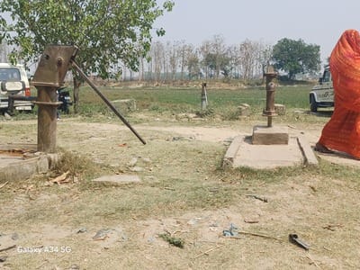 Throats drying up in the heat, the hand pump and water cooler at the temple failed.