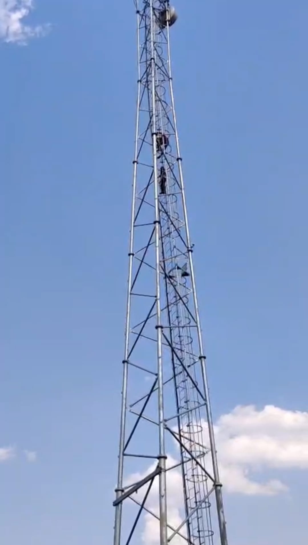 Couple climbs tower for love, high voltage drama continues for three hours