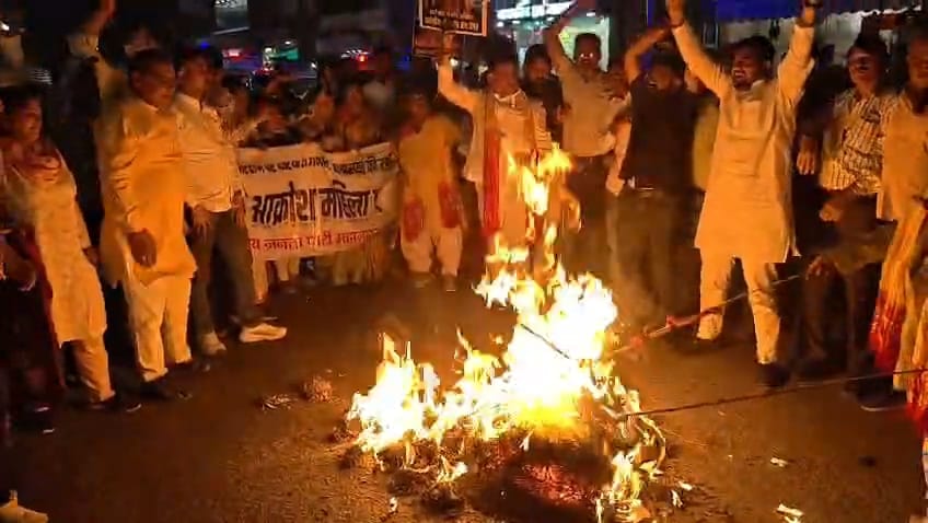 Women took out a march and burnt effigies of opposition leaders