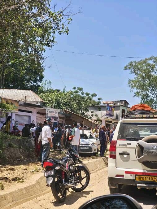 A car collided with a parapet in Gagal, killing a woman and injuring four others.