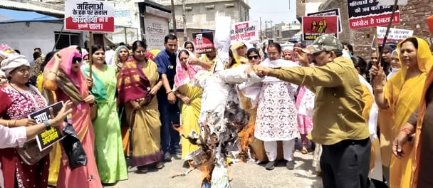 Women took out a march to express their anger and burnt effigies of opposition parties.