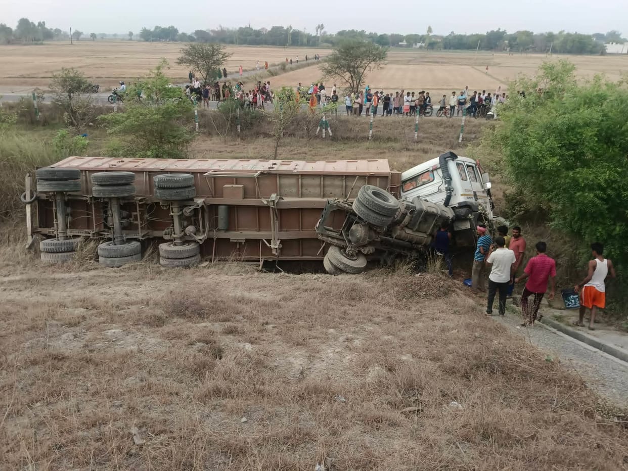 Driver Dozes Off; Sand-Laden Trailer Overturns into Gorge