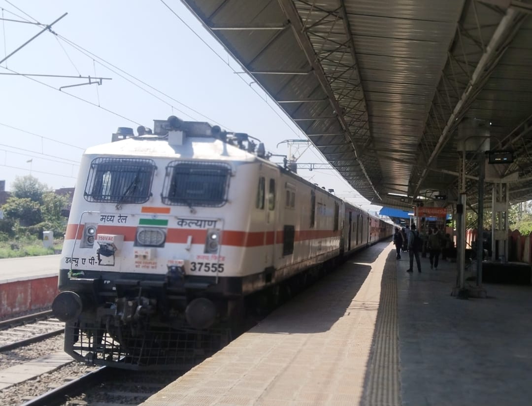 Passengers are troubled by the delay in trains during the scorching heat.